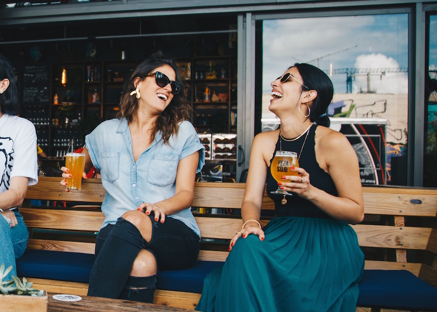 Two females enjoying beer at one of the top autumn events in Nashville.